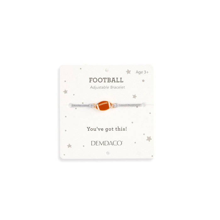Bracelet with football design on a white card with text, Demdaco brand visible