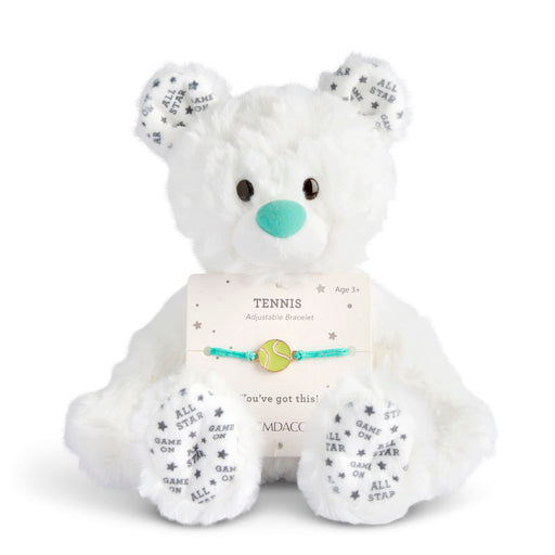 White teddy bear with a tennis-themed adjustable bracelet on a white background