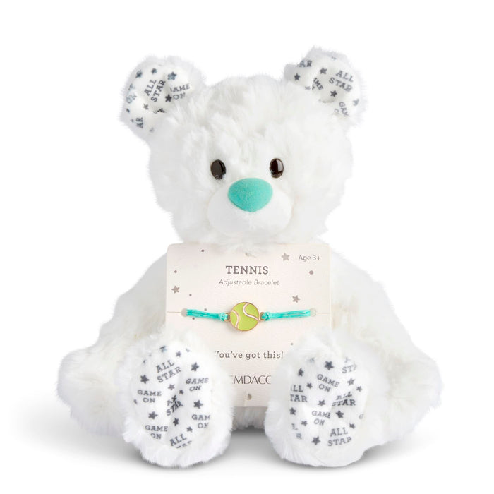White teddy bear with a tennis-themed adjustable bracelet on a white background
