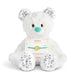 White teddy bear with a tennis-themed adjustable bracelet on a white background