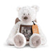 White teddy bear with a photo inside and 'Here to Hug' tag on a white background