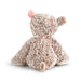 Plush teddy bear with a pink bow on a white background