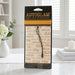 Autoglam auto air freshener packaging on a white surface with decorative items.