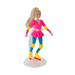 Toy figure of a superheroine in a pink outfit with yellow accents on a white background