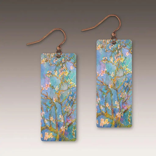 Rectangular earrings with floral design on a gray background