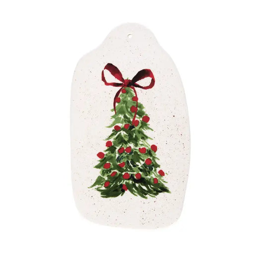 Decorative plate with a Christmas tree and red bow design on a white background