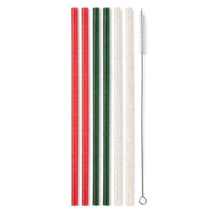Set of red, green, and white straws with a cleaning brush on a white background