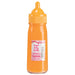 Orange toy baby bottle with yellow cap on a white background