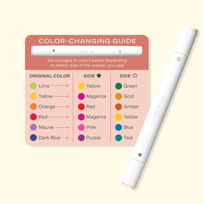Color-changing marker with a color guide on a light pink background