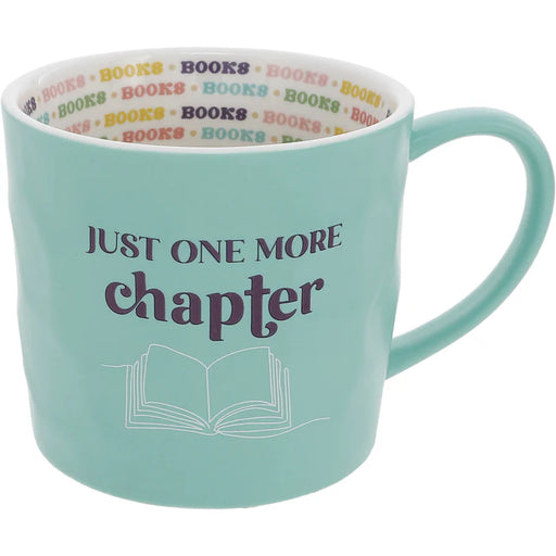 Mint green mug with 'Just One More Chapter' text and book illustration on a white background