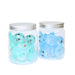 Two glass jars with metal lids containing blue firefly-like creatures on a white background