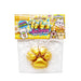 A packaged novelty item labeled 'Licious Golden Paws' in a clear plastic bag with a colorful printed header card. Inside are four shiny gold paw-shaped items, likely chocolate or candy, on a plain white background.