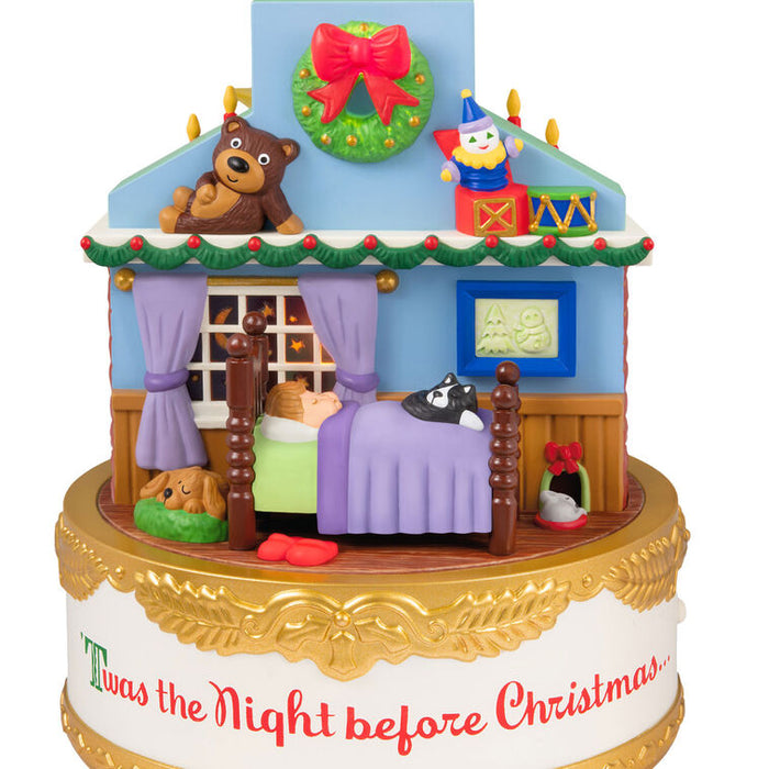 Decorative Christmas scene with characters and text 'Twas the Night before Christmas' on a white background.