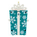 Decorative ornament shaped like a blue gift box with white snowflakes and a white bow on a white background.