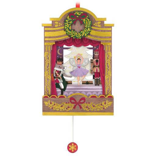 Decorative ornament with Nutcracker scene on a white background