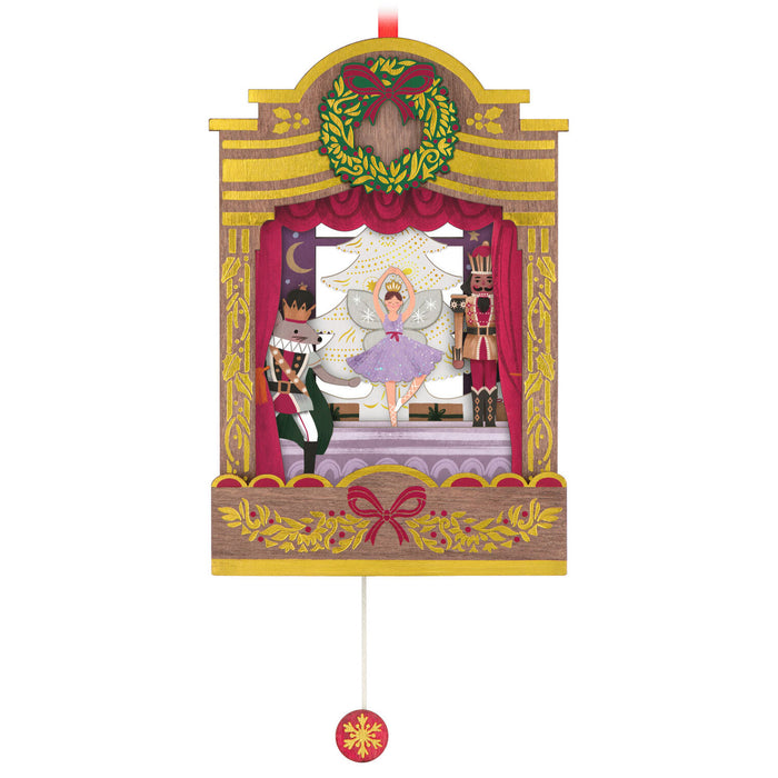 Decorative ornament with Nutcracker scene on a white background