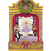 Decorative Nutcracker scene with fairy and soldiers in a wooden frame with wreath and ribbons.
