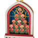 Decorative Christmas ornament with a choir of children singing in a stained glass window design.