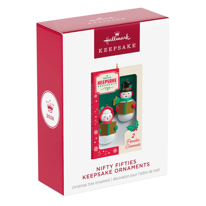 Hallmark Keepsake ornament packaging with two Christmas tree ornaments on a white background