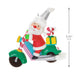 Santa Claus ornament riding a motorcycle with candy and gifts, featuring a measurement label.