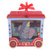 Decorative ornament with Dumbo and Mrs. Jumbo in a designed cutout, featuring a red ribbon on top.