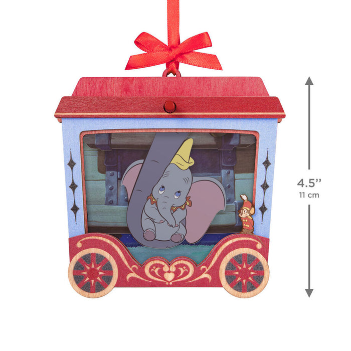 Decorative ornament with Dumbo and Mrs. Jumbo in a designed cutout, featuring a red ribbon on top on a white background