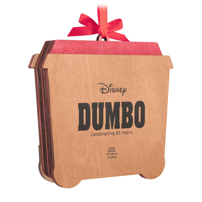 Disney Dumbo logo with a red ribbon on a white background