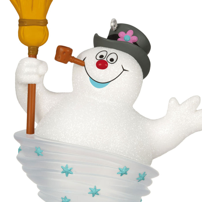 Snowman figurine with a broom and hat on a white background