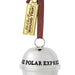 Decorative bell with 'The Polar Express' text and a gold ticket tag on a white background