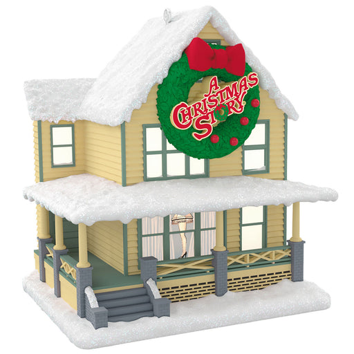 Model of a house with a Christmas wreath and 'A Christmas Story' text on a white background