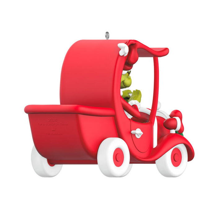 Red truck sleigh ornament with white wheels on a white background