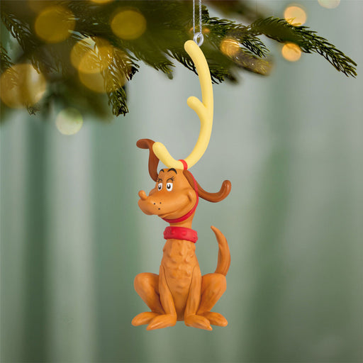 Max the Reindeer Dog ornament hanging on a Christmas tree