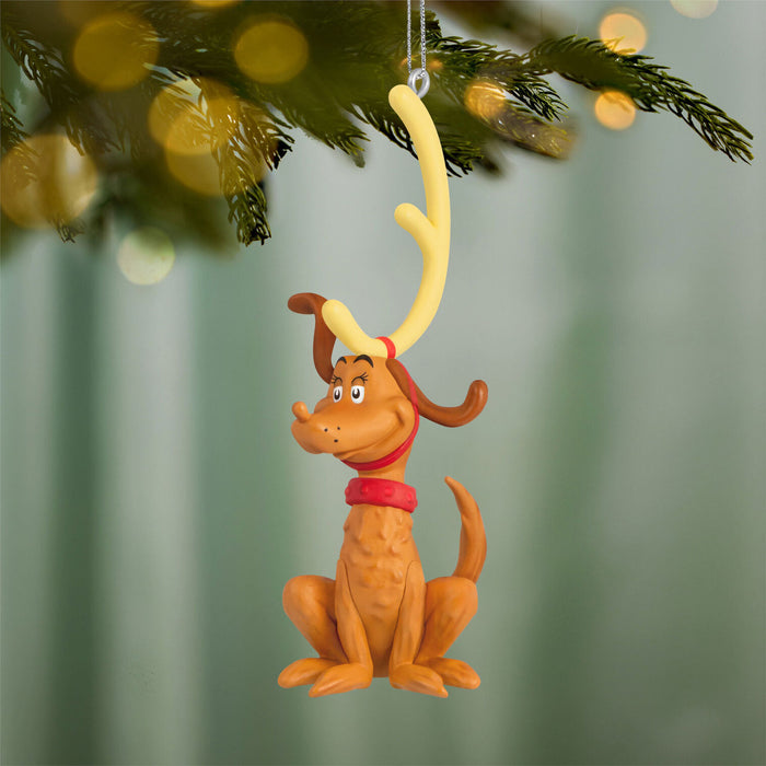 Max the Reindeer Dog ornament hanging on a Christmas tree