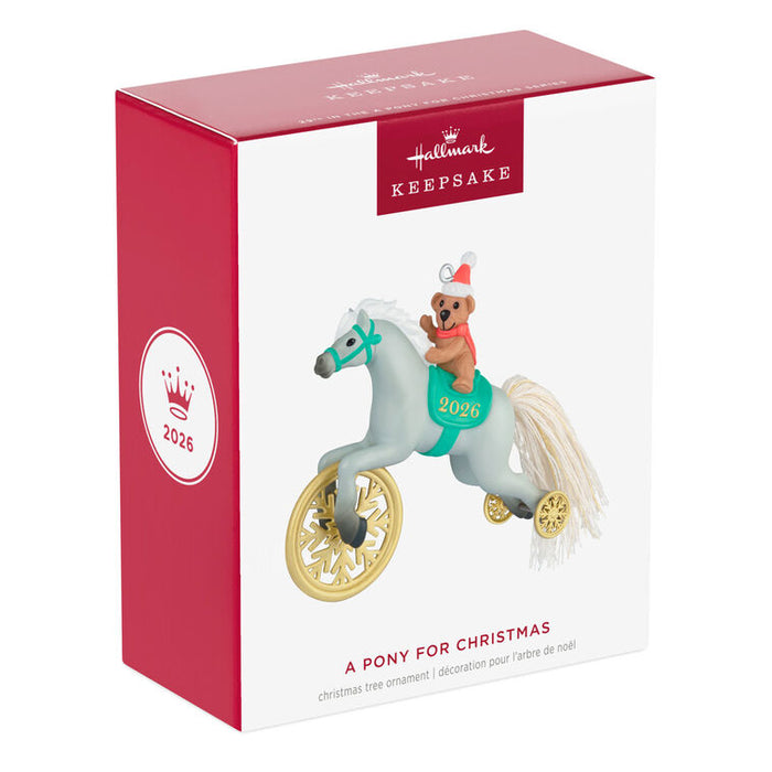 Hallmark 2026 Christmas ornament packaging with a toy pony and teddy bear figure on a white background