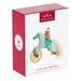 Hallmark 2026 Christmas ornament packaging with a toy pony and teddy bear figure on a white background
