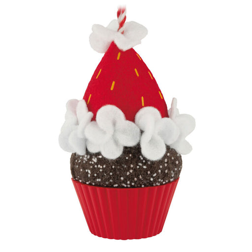 Decorative cupcake ornament with red and white icing, on a white background