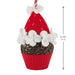Decorative cupcake ornament with red icing, white frosting, and chocolate base, featuring a measurement label.