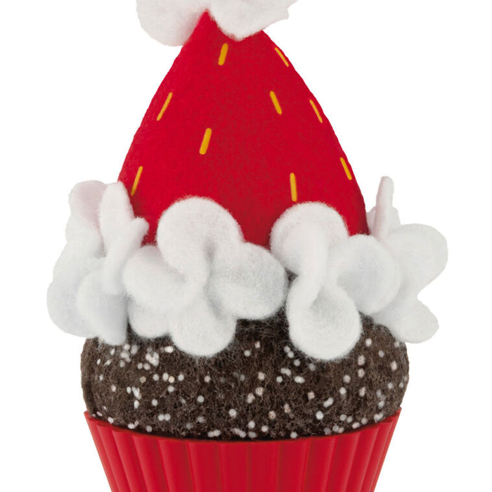 Cupcake figurine with a red frosting and brown cake on a white background