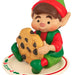 Elf figurine holding a cookie on a white background