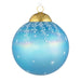 Blue Christmas ornament with white snowflake patterns on a white background