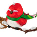 Decorative red bird ornament with a green scarf on a branch against a white background