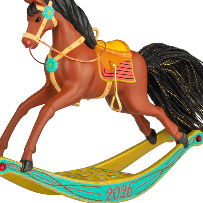 Decorative rocking horse with '2026' on a white background