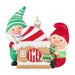 Decorative Christmas ornament with two gnomes and a gingerbread house on a white background
