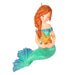 Mermaid figurine with a starfish on a white background