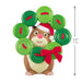 Hamster figurine wearing a Santa hat with a green wreath made of buttons and red bow, on a white background.