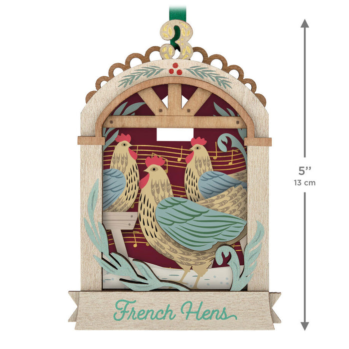 Decorative ornament with chickens and 'French Hens' text, featuring measurements on a white background.