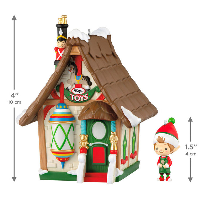 Decorative toy store with an elf figure and measurements on a white background