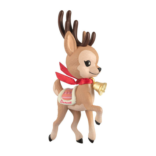 Reindeer ornament with a red scarf and bell on a white background