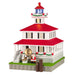 Decorative lighthouse model with Santa Claus and polar bear on a white background