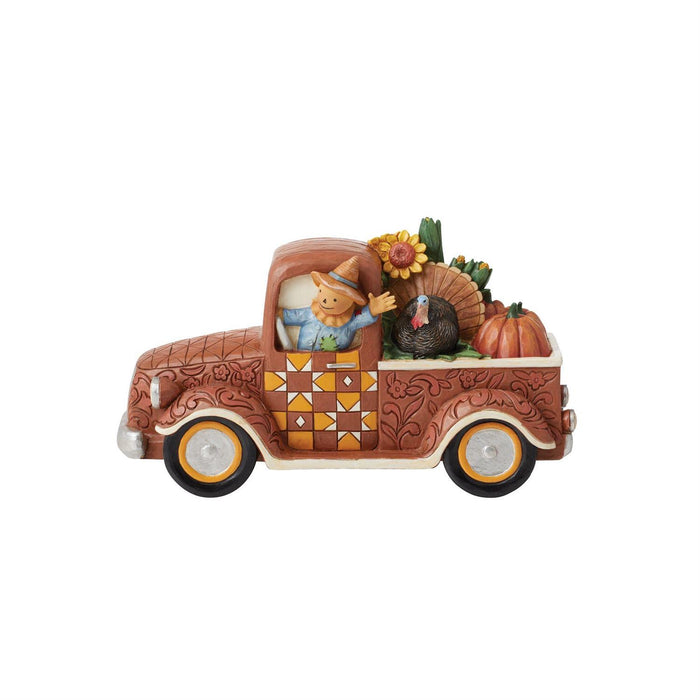 Decorative figurine of a truck with a cat and turkey, featuring autumn elements on a white background.